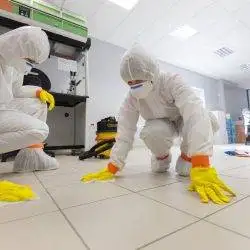 Decontamination of a room after an incident. Practical exercises during a training session on asbestos risk prevention, sample preparation room of an environmental laboratory specialized in the analysis of asbestos fibers